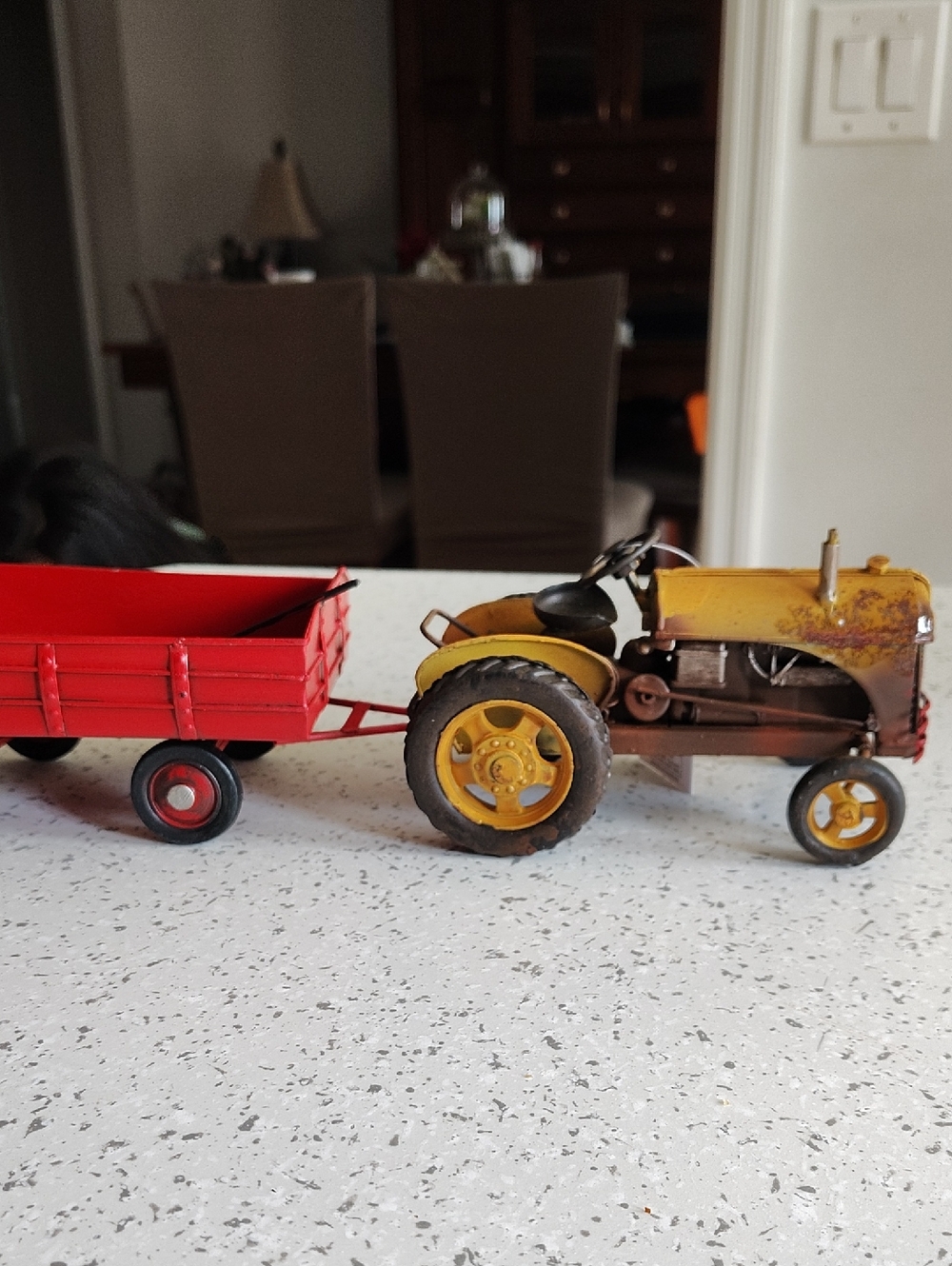 Rustic Yellow Tractor with Red Trailer